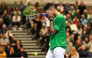 4 February 2024; Michael Agwi of Ireland reacts during his singles match against Lucas Miedler of Austria on day two of the Davis Cup World Group I Play-off 1st Round match between Ireland and Austria at UL Sport Arena in Limerick. Photo by Brendan Moran/Sportsfile
