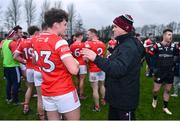 4 February 2024; Louth manager Ger Brennan, right, with Dylan McKeown of Louth after their side's victory in the Allianz Football League Division 2 match between Louth and Cork at DEFY Páirc Mhuire in Ardee, Louth. Photo by Ben McShane/Sportsfile