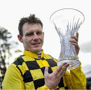 04 February 2024; Jockey Paul Townend with the cup after winning the Chanelle Pharma Irish Champion Hurdle on State Man during day two of the Dublin Racing Festival at Leopardstown Racecourse in Dublin. Photo by David Fitzgerald/Sportsfile