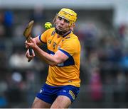 4 February 2024; Mark Rogers of Clare strike a free during the Allianz Hurling League Division 1 Group A match between Clare and Cork at Cusack Park in Ennis, Clare. Photo by Ray McManus/Sportsfile