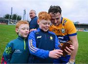 4 February 2024; Darragh Lohan of Clare poses for a 'selfie' with Clare supporters, Darach and Oran McNamara, left, from Bodyke, after the Allianz Hurling League Division 1 Group A match between Clare and Cork at Cusack Park in Ennis, Clare. Photo by Ray McManus/Sportsfile