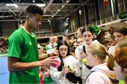 4 February 2024; Michael Agwi of Ireland signs autographs for supporters after his singles match against Lucas Miedler of Austria on day two of the Davis Cup World Group I Play-off 1st Round match between Ireland and Austria at UL Sport Arena in Limerick. Photo by Brendan Moran/Sportsfile