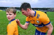4 February 2024; Diarmuid Ryan of Clare autographs the shirt of Clare supporter Morgan Meehan, 10 years, from Feakle, after the Allianz Hurling League Division 1 Group A match between Clare and Cork at Cusack Park in Ennis, Clare. Photo by Ray McManus/Sportsfile