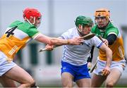 4 February 2024; Conor Sheehan of Waterford in action against Sam Bourke, left, and Cillian Kiely of Offaly during the Allianz Hurling League Division 1 Group A match between Offaly and Waterford at Glenisk O'Connor Park in Tullamore, Offaly. Photo by Tyler Miller/Sportsfile