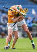 4 February 2024; Aodhan O'Brien of Antrim tussles with Cathal O'Neill of Limerick during the Allianz Hurling League Division 1 Group B match between Limerick and Antrim at FBD Semple Stadium in Thurles, Tipperary. Photo by Tom Beary/Sportsfile