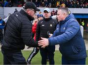 4 February 2024; The two managers, Clare manager Brian Lohan and Cork manager Pat Ryan, shake hands after the Allianz Hurling League Division 1 Group A match between Clare and Cork at Cusack Park in Ennis, Clare. Photo by Ray McManus/Sportsfile