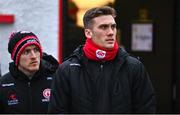 4 February 2024; Suspended Tyrone player Conn Kilpatrick, right, and Peter Harte of Tyrone before the Allianz Football League Division 1 match between Derry and Tyrone at Celtic Park in Derry. Photo by Ramsey Cardy/Sportsfile