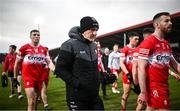 4 February 2024; Derry manager Mickey Harte leaves the pitch at half-time of the Allianz Football League Division 1 match between Derry and Tyrone at Celtic Park in Derry. Photo by Ramsey Cardy/Sportsfile