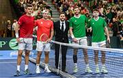 4 February 2024; Alexander Erler and Lucas Miedler of Austria, left, and David O'Hare and Conor Gannon of Ireland with umpire Robin Lambours before their doubles match on day two of the Davis Cup World Group I Play-off 1st Round match between Ireland and Austria at UL Sport Arena in Limerick. Photo by Brendan Moran/Sportsfile