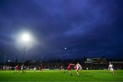 4 February 2024; Brian Kennedy of Tyrone kicks at goal under pressure from Brendan Rogers of Derry during the Allianz Football League Division 1 match between Derry and Tyrone at Celtic Park in Derry. Photo by Ramsey Cardy/Sportsfile