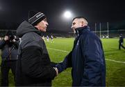 4 February 2024; Donegal manager Jim McGuinness and Cavan manager Raymond Galligan after the Allianz Football League Division 2 match between Cavan and Donegal at Kingspan Breffni in Cavan. Photo by Stephen McCarthy/Sportsfile