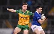 4 February 2024; Niall Carolan of Cavan in action against Odhran Doherty of Donegal during the Allianz Football League Division 2 match between Cavan and Donegal at Kingspan Breffni in Cavan. Photo by Stephen McCarthy/Sportsfile