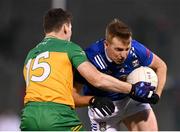 4 February 2024; Jason McLoughlin of Cavan in action against Jamie Brennan of Donegal during the Allianz Football League Division 2 match between Cavan and Donegal at Kingspan Breffni in Cavan. Photo by Stephen McCarthy/Sportsfile