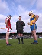 4 February 2024; Referee Paul Faloon with the two captains, Sean O'Donoghue of Cork and Conor Cleary of Clare, before the Allianz Hurling League Division 1 Group A match between Clare and Cork at Cusack Park in Ennis, Clare. Photo by Ray McManus/Sportsfile