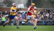 4 February 2024; Sean Twomey of Cork in action against Diarmuid Ryan of Clare during the Allianz Hurling League Division 1 Group A match between Clare and Cork at Cusack Park in Ennis, Clare. Photo by Ray McManus/Sportsfile