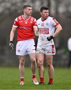 4 February 2024; Conall McKeever of Louth and Mark Cronin of Cork during the Allianz Football League Division 2 match between Louth and Cork at DEFY Páirc Mhuire in Ardee, Louth. Photo by Ben McShane/Sportsfile