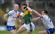 4 February 2024; Cillian Burke of Kerry in action against Ryan Wylie, right, and Kevin Loughran of Monaghan during the Allianz Football League Division 1 match between Monaghan and Kerry at St Tiernach's Park in Clones, Monaghan. Photo by Sam Barnes/Sportsfile