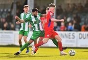 5 February 2024; Cian Doyle of Shelbourne is tackled by Guillermo Almirall of Bray Wanderers during the PTSB Leinster Senior Cup match between Bray Wanderers and Shelbourne at Carlisle Grounds in Bray, Wicklow. Photo by Ben McShane/Sportsfile