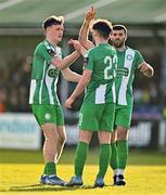 5 February 2024; Shane Griffin of Bray Wanderers, centre, celebrates with teammates Freddie Turley, left, and Guillermo Almirall, right, after scoring their side's first goal during the PTSB Leinster Senior Cup match between Bray Wanderers and Shelbourne at Carlisle Grounds in Bray, Wicklow. Photo by Ben McShane/Sportsfile