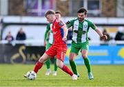 5 February 2024; Cian Doyle of Shelbourne in action against Shane Griffin of Bray Wanderers during the PTSB Leinster Senior Cup match between Bray Wanderers and Shelbourne at Carlisle Grounds in Bray, Wicklow. Photo by Ben McShane/Sportsfile
