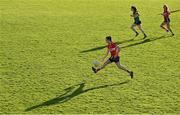 5 February 2024; Hannah Looney of Cork solos the ball upfield during the 2024 Lidl Ladies National Football League Division 1 Round 3 match between Kerry and Cork at Austin Stack Park in Tralee, Kerry. Photo by Brendan Moran/Sportsfile