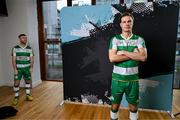 3 February 2024; Daniel Cleary poses for a portrait as team-mate Jack Byrne, left, awaits his turn during a Shamrock Rovers squad portraits session at Tallaght Stadium in Dublin. Photo by Stephen McCarthy/Sportsfile