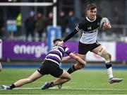 6 February 2024; Peter Murphy of Newbridge College evades the tackle of Sean Ringwood of Terenure College during the Bank of Ireland Leinster Schools Junior Cup Round 1 match between Newbridge College and Terenure College at Energia Park in Dublin. Photo by Harry Murphy/Sportsfile