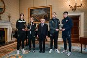 6 February 2024; The President of Ireland Michael D Higgins receives FAI President's Cup representatives, from left, Karen Duggan of Peamount United, Laurie Ryan of Athlone Town, Lee Grace of Shamrock Rovers and Joe Redmond of St Patrick's Athletic at Áras an Uachtaráin in Dublin. On Friday 9th February, last season’s SSE Airtricity Men’s Premier Division champions Shamrock Rovers will play the 2023 Sports Direct Men’s FAI Cup winners St Patrick’s Athletic. On Saturday 2 March, 2023 Sports Direct FAI Women's Cup winners Athlone Town will play the SSE Airtricity Women's Premier Division champions Peamount United at Athlone Town Stadium. Photo by Stephen McCarthy/Sportsfile