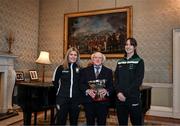 6 February 2024; The President of Ireland Michael D Higgins receives FAI President's Cup representatives Laurie Ryan of Athlone Town, left, and Karen Duggan of Peamount United at Áras an Uachtaráin in Dublin. On Friday 9th February, last season’s SSE Airtricity Men’s Premier Division champions Shamrock Rovers will play the 2023 Sports Direct Men’s FAI Cup winners St Patrick’s Athletic. On Saturday 2 March, 2023 Sports Direct FAI Women's Cup winners Athlone Town will play the SSE Airtricity Women's Premier Division champions Peamount United at Athlone Town Stadium. Photo by Stephen McCarthy/Sportsfile