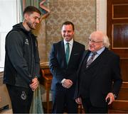 6 February 2024; The President of Ireland Michael D Higgins receives FAI President's Cup representative Lee Grace of Shamrock Rovers in the company of League of Ireland director Mark Scanlon at Áras an Uachtaráin in Dublin. On Friday 9th February, last season’s SSE Airtricity Men’s Premier Division champions Shamrock Rovers will play the 2023 Sports Direct Men’s FAI Cup winners St Patrick’s Athletic. On Saturday 2 March, 2023 Sports Direct FAI Women's Cup winners Athlone Town will play the SSE Airtricity Women's Premier Division champions Peamount United at Athlone Town Stadium. Photo by Stephen McCarthy/Sportsfile