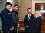 6 February 2024; The President of Ireland Michael D Higgins receives FAI President's Cup representatives Joe Redmond of St Patrick's Athletic, left, and Lee Grace of Shamrock Rovers in the company of League of Ireland director Mark Scanlon at Áras an Uachtaráin in Dublin. On Friday 9th February, last season’s SSE Airtricity Men’s Premier Division champions Shamrock Rovers will play the 2023 Sports Direct Men’s FAI Cup winners St Patrick’s Athletic. On Saturday 2 March, 2023 Sports Direct FAI Women's Cup winners Athlone Town will play the SSE Airtricity Women's Premier Division champions Peamount United at Athlone Town Stadium. Photo by Stephen McCarthy/Sportsfile