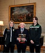 6 February 2024; The President of Ireland Michael D Higgins receives FAI President's Cup representatives Laurie Ryan of Athlone Town, left, and Karen Duggan of Peamount United at Áras an Uachtaráin in Dublin. On Friday 9th February, last season’s SSE Airtricity Men’s Premier Division champions Shamrock Rovers will play the 2023 Sports Direct Men’s FAI Cup winners St Patrick’s Athletic. On Saturday 2 March, 2023 Sports Direct FAI Women's Cup winners Athlone Town will play the SSE Airtricity Women's Premier Division champions Peamount United at Athlone Town Stadium. Photo by Stephen McCarthy/Sportsfile