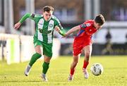 5 February 2024; Callum Thompson of Bray Wanderers and Sean Cummins of Shelbourne during the PTSB Leinster Senior Cup match between Bray Wanderers and Shelbourne at Carlisle Grounds in Bray, Wicklow. Photo by Ben McShane/Sportsfile