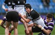 6 February 2024; Brion Donagh of Newbridge College is tackled by Niall Fallon of Terenure College during the Bank of Ireland Leinster Schools Junior Cup Round 1 match between Newbridge College and Terenure College at Energia Park in Dublin. Photo by Harry Murphy/Sportsfile