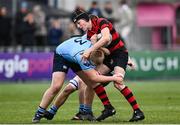 6 February 2024; Sam Carter of Kilkenny College is tackled by Daniel O'Donohoe of St Michaels College during the Bank of Ireland Leinster Schools Junior Cup Round 1 match between Kilkenny College and St Michael's College at Energia Park in Dublin. Photo by Harry Murphy/Sportsfile