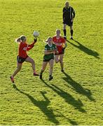 5 February 2024; Daire Kiely of Cork gathers possession ahead of Niamh Carmody of Kerry and teammate Kate Redmond of Cork during the 2024 Lidl Ladies National Football League Division 1 Round 3 match between Kerry and Cork at Austin Stack Park in Tralee, Kerry. Photo by Brendan Moran/Sportsfile