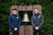 6 February 2024; Joe Redmond of St Patrick's Athletic and Lee Grace of Shamrock Rovers at the Peace Bell during a tour of Áras an Uachtaráin after FAI President's Cup representatives were received by The President of Ireland Michael D Higgins at Áras an Uachtaráin in Dublin. On Friday 9th February, last season’s SSE Airtricity Men’s Premier Division champions Shamrock Rovers will play the 2023 Sports Direct Men’s FAI Cup winners St Patrick’s Athletic. On Saturday 2 March, 2023 Sports Direct FAI Women's Cup winners Athlone Town will play the SSE Airtricity Women's Premier Division champions Peamount United at Athlone Town Stadium. Photo by Stephen McCarthy/Sportsfile