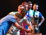 7 February 2024; Ronan Finn of UCD, left, and Greg Bolger of Cork City inspect the SSE Airtricity League Division One Trophy at the launch of the SSE Airtricity League of Ireland 2024 season held at Vicar Street in Dublin. Photo by Sam Barnes/Sportsfile