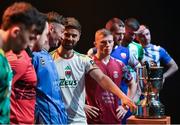 7 February 2024; Greg Bolger of Cork City, fourth from left, and Ronan Finn of UCD, third from left, inspect the SSE Airtricity League Division One Trophy at the launch of the SSE Airtricity League of Ireland 2024 season held at Vicar Street in Dublin. Photo by Sam Barnes/Sportsfile