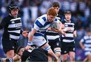7 February 2024; Paul Hartnett of Blackrock College is tackled by Sean Stone of Cistercian College Roscrea during Bank of Ireland Leinster Schools Junior Cup Round 1 match between Cistercian College Roscrea and Blackrock College at Energia Park in Dublin. Photo by Tyler Miller/Sportsfile