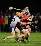 7 February 2024; Ger Millerick of UCC in action against Adam English, left, and Mark Fitzgerald of UL during the Electric Ireland Higher Education GAA Fitzgibbon Cup quarter-final match between UL and UCC at University of Limerick Grounds in Limerick. Photo by Piaras Ó Mídheach/Sportsfile