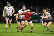 7 February 2024; Ger Millerick of UCC in action against Adam English, right, and Mark Fitzgerald of UL during the Electric Ireland Higher Education GAA Fitzgibbon Cup quarter-final match between UL and UCC at University of Limerick Grounds in Limerick. Photo by Piaras Ó Mídheach/Sportsfile