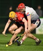 7 February 2024; Peter McGarry of UCC in action against TJ Brennan of UL during the Electric Ireland Higher Education GAA Fitzgibbon Cup quarter-final match between UL and UCC at University of Limerick Grounds in Limerick. Photo by Piaras Ó Mídheach/Sportsfile