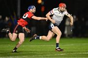 7 February 2024; Darragh Lohan of UL gets away from Eddie Stokes of UCC during the Electric Ireland Higher Education GAA Fitzgibbon Cup quarter-final match between UL and UCC at University of Limerick Grounds in Limerick. Photo by Piaras Ó Mídheach/Sportsfile