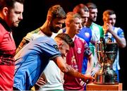 7 February 2024; Ronan Finn of UCD inspects the SSE Airtricity Men's First Division trophy at the launch of the SSE Airtricity League of Ireland 2024 season held at Vicar Street in Dublin. Photo by Sam Barnes/Sportsfile