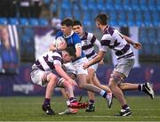 8 February 2024; Donal Manzor of St Mary’s College is tackled by Hugh Kearney of Clongowes Wood College during the Bank of Ireland Leinster Schools Junior Cup Round 1 match between St Mary's College and Clongowes Wood College at Energia Park in Dublin. Photo by Daire Brennan/Sportsfile