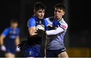 8 February 2024; Diarmuid Moriarty of UCD, left, in action against Jack McCabe of University of Limerick during the Electric Ireland Higher Education GAA Sigerson Cup semi-final match between UCD and University of Limerick at the SETU Carlow Campus in Carlow. Photo by David Fitzgerald/Sportsfile