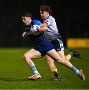 8 February 2024; Sam Callinan of UCD in action against Paul Walsh of University of Limerick during the Electric Ireland Higher Education GAA Sigerson Cup semi-final match between UCD and University of Limerick at the SETU Carlow Campus in Carlow. Photo by David Fitzgerald/Sportsfile