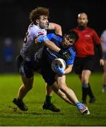8 February 2024; Sam Callinan of UCD, right, in action against Paul Walsh of University of Limerick during the Electric Ireland Higher Education GAA Sigerson Cup semi-final match between UCD and University of Limerick at the SETU Carlow Campus in Carlow. Photo by David Fitzgerald/Sportsfile