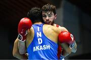 9 February 2024; Eugene McKeever of Ireland, right, in action against Akash Akash of India in their Light Middleweight 71kg bout during the 75th International Boxing Tournament Strandja in Sofia, Bulgaria. Photo by Ivan Ivanov/Sportsfile